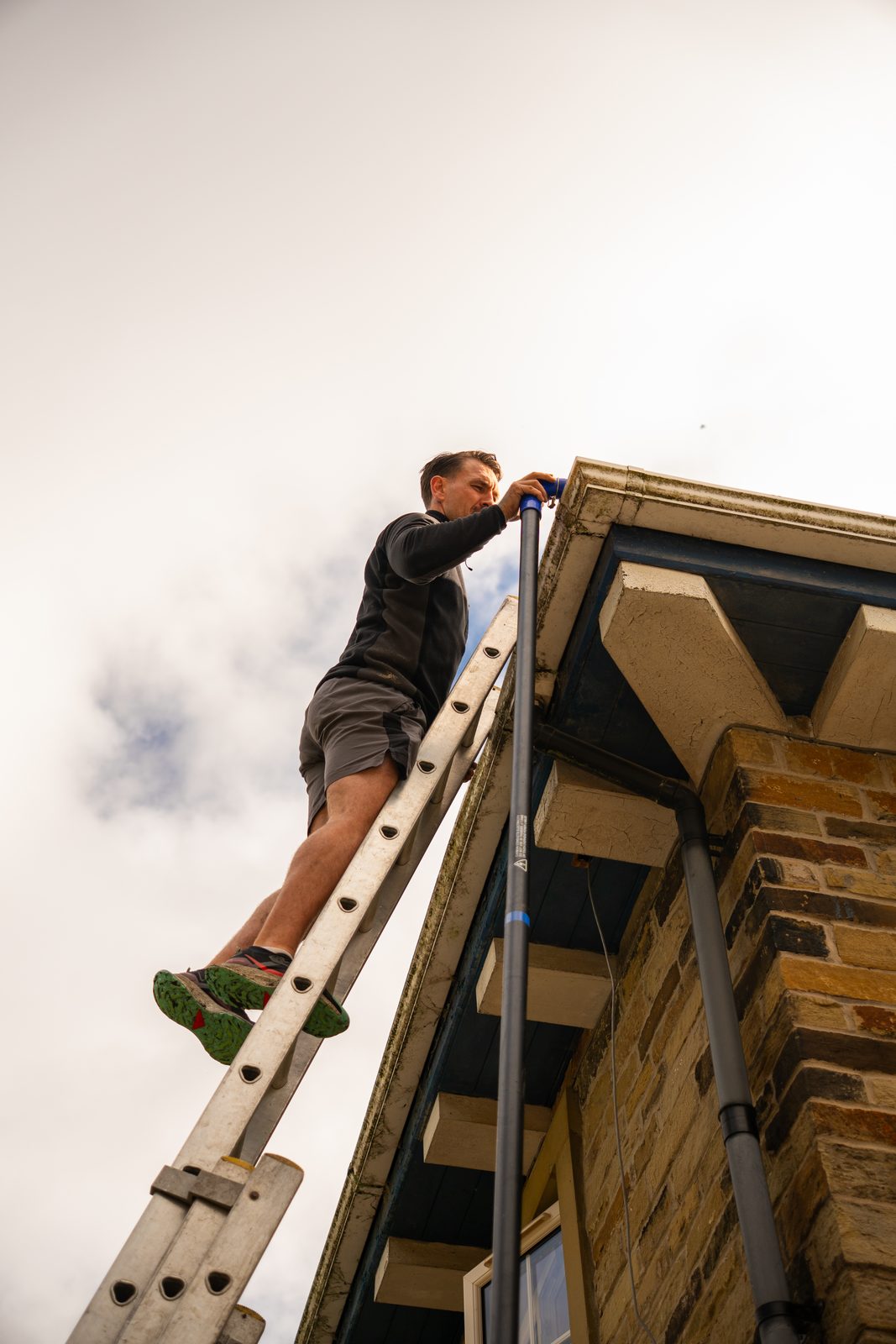 Checking a gutter at roof level